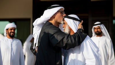 Sheikh Khaled bin Mohamed, Crown Prince of Abu Dhabi, consoles a relative of Warrant Officer Saeed Al Shamsi. Photo: Abu Dhabi Media Office