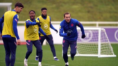 Harry Kane, right, and Raheem Sterling train for England's World Cup qualifier against Albania at St George's Park. PA