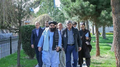 Taliban foreign minister Amir Khan Muttaqi, second left, and Russia's special envoy to Afghanistan, Zamir Kabulov, second right, during a meeting in Kabul. AFP