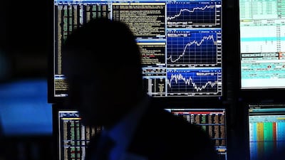 Market volatility may increase as the pace of economic growth rises and quantitative easing ends. Spencer Platt / Getty Images / AFP