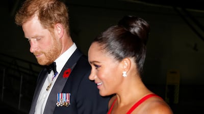 The couple wore poppy pins to park UK Remembrance Day on November 11. Reuters