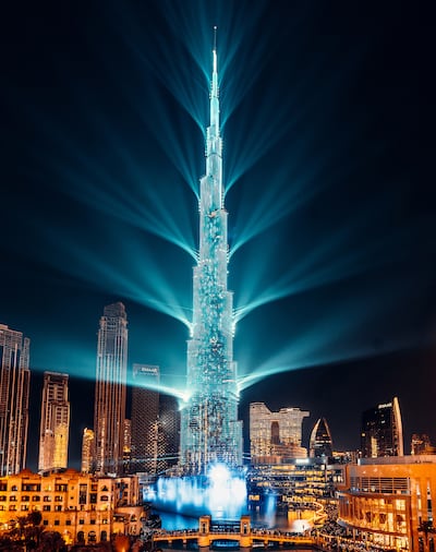 The light beams from the Burj Khalifa New Year's Eve laser show will purportedly set a new world record for travelling the longest distance. Photo: Emaar