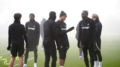 Chelsea's Pierre-Emerick Aubameyang jokes with teammates during training. PA