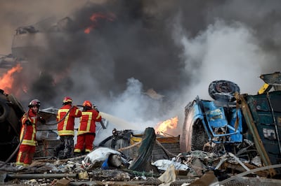 Firefighters try to extinguish flames after a large explosion rocked Beirut Port in Lebanon in August 2020. EPA