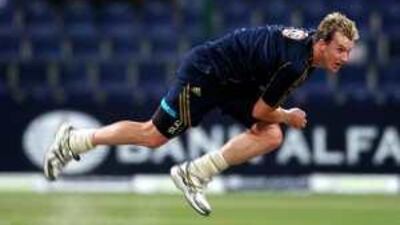 The Australian fast bowler Brett Lee, his ankles protected by bandages after surgery, in full flight during a practice session taken at the tea interval on Friday.