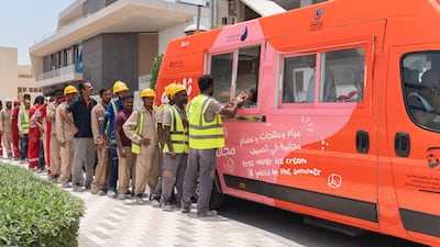 Workers in Dubai queue at an Al Freej Fridge van. Photo: Mohammed Bin Rashid Maktoum Global Initiatives/Ferjan Dubai