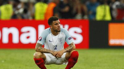 England’s Kyle Walker looks dejected after Russia’s Vasili Berezutski scores their first goal in their Euro 2016 match. Jason Cairnduff / Reuters