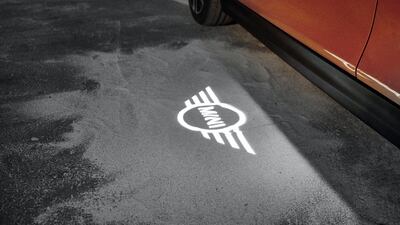Projections of the Mini logo from the front doors are a new feature. Mini