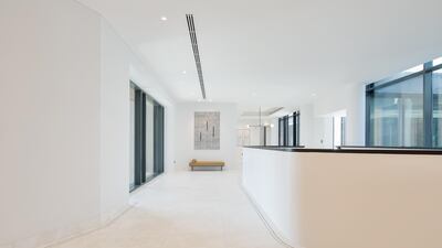 Clean lines in the upstairs landing. Courtesy Luxhabitat Sotheby's International Realty