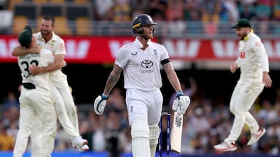 Australia’s Michael Neser, second left, celebrates with teammates after claiming the wicket of England captain Ben Stokes. AFP
