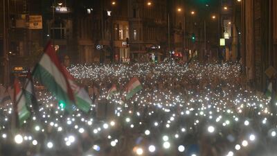 Demonstrators against the results of the 08 April general election turn on the lights of their mobile phones on Szabadsajto (Freedom of the Press) Road in Budapest, Hungary, 21 April 2018. EPA/Zsolt Szigetvary