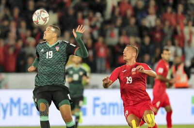 Ismail Ahmed, left, and the rest of the UAE defence have looked jittery in their four Asian Cup matches to date. Pawan Singh / The National