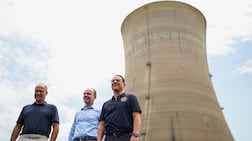 Pennsylvania Governor Josh Shapiro, right, with Bobby Hollis of Microsoft, centre, and Joe Dominguez, Constellation Energy chief executive, at the Three Mile Island nuclear plant in 2025. Reuters