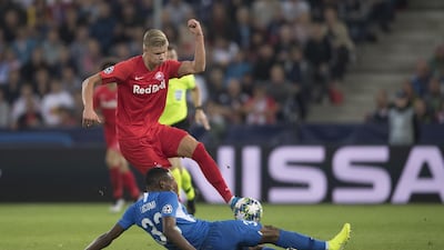 Erling Haaland of FC Salzburg and Jhon Lucumi of KRC Genk during the Champions League group E match. Getty Images