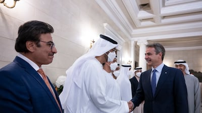 Dr Sultan Al Jaber, Minister of Industry and Advanced Technology, is received by Mr Mitsotakis alongside Sulaiman Al Mazroui, UAE Ambassador to Greece.