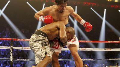 Manny Pacquiao fights Timothy Bradley during their bout last April in Las Vegas, with Pacquiao earning his second of three successive wins since his return in November 2013 following two straight losses in 2012 and a nine-month layoff. Mike Young for The National / April 12, 2014