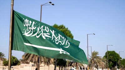 Saudi Arabia flags are flown across the UAE ahead of the country's national day. Victor Besa / The National