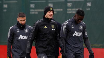 Manchester United's Nemanja Matic and Axel Tuanzebe. Reuters