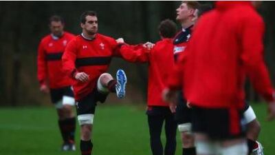 Sam Warburton, left, captain of Wales warms up during a training session on Tuesday. Warburton is one of several breakaway forwards who will captain his side into the Six Nations tournament.