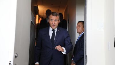 French President Emmanuel Macron arrives at the French delegation office to meet with Palestine President Mahmoud Abbas for a bilateral meeting on the sidelines of the United Nations General Assembly at the UN headquarters on September 23, 2019, in New York. AFP