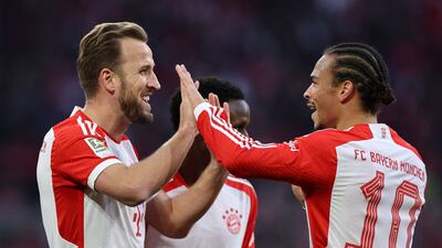 Harry Kane celebrates with teammate Leroy Sane after scoring Bayern Munich's second goal against FC Heidenheim. EPA