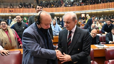 Shehbaz Sharif, right, is congratulated by his brother Nawaz Sharif after being elected Pakistan's Prime Minister in the National Assembly on Sunday. EPA