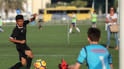 Muscat Football Academy and CS Luceafarul in action during the under 14 final at the Manchester City Abu Dhabi Cup. Victor Besa / The National