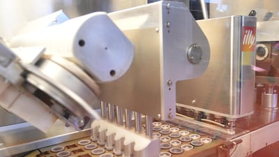 The production line of espresso capsules at the Illy caffe plant in Trieste. AFP
