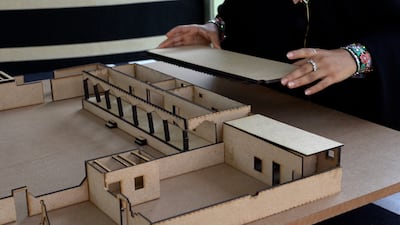 An architectural model of a traditional Emirati home.