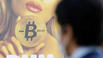 An advertisement for a cryptocurrency exchange in Tokyo, Japan. Kraken has pulled out of the country. Toru Hanai/Reuters