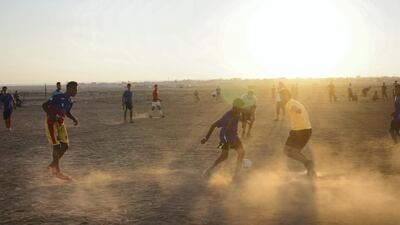 It's a stark contrast to the dusty field they were playing on in Jordan's Zaatari refugee camp. Courtesy The Black Pearls Academy