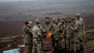 Turkish soldiers near the Syrian-Turkish border today as Operation Olive Branch ramps up. EPA