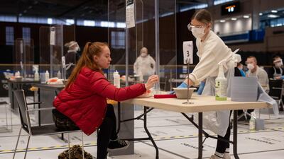 A student takes a rapid coronavirus test at the University of Hull. AFP