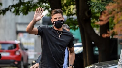 Newly hired AC Milan soccer club player Olivier Giroud arrives at a medical center in Milan, Italy, Friday, July, 16, 2021. (Claudio Furlan / LaPresse via AP)