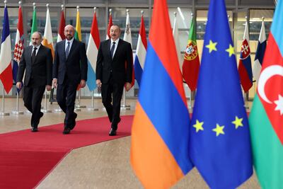Armenian Prime Minister Nikol Pashinyan, European Council President Charles Michel and Azerbaijan President Ilham Aliyev arrive for a meeting in Brussels in April 2022. AFP