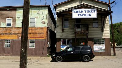 A car is parked outside of the “Hard Times Tavern” in Fort Gay, West Virginia. Robert Galbraith / Reuters