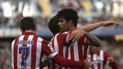 Atletico Madrid react after Diego Costa's goal on Saturday. Jon Nazca / Reuters
