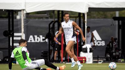 Lucas Vazquez has a shot blocked at training. EPA