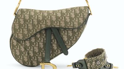 An olive Toile Monogram Canvas & Toile Saddle Bag with gold hardware. Estimate: £1,500- 2,000. Courtesy Christie's