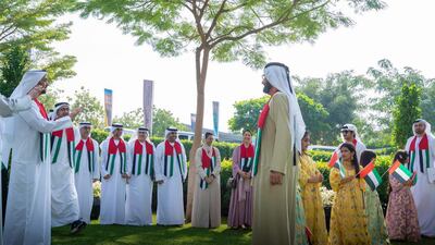 Ministers wear the Emirati national colours to mark National Day weekend