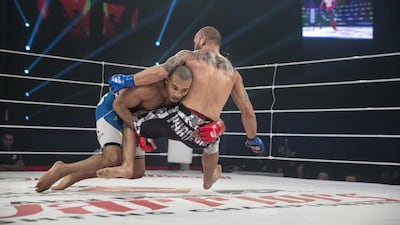 Fighters taking part in the Abu Dhabi Warriors 2 event at Ipic Arena at Zayed Sports City. Silivia Razgova / The National