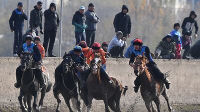 Riders in the traditional Central Asian sport of Kok-Boru (gray wolf) or Buzkashi (goat grabbing) in Bishkek, Kyrgyzstan. Mounted players compete for points by throwing a stuffed sheepskin into a well. AFP