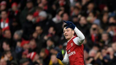 Arsene Wenger still hopes Mesut Ozil will be an Arsenal player next season. Tony O'Brien / Action Images via Reuters