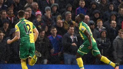Norwich City’s Alexander Tettey celebrates scoring their second, winning goal against Manchester United on Saturday. Peter Powell / EPA
