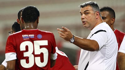 Dubai, United Arab Emirates- August, 04, 2013: Cosmin Olaroiu (C) the new Head Coach ,Al Ahli club gestures during the friendly match against Ajman Club at the Rashid Stadium in Dubai . ( Satish Kumar / The National ) For Sports / Story by John Mcauley