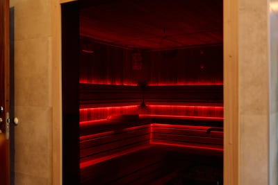 Infrared saunas can be found alongside fitness facilities and holistic classes in modern wellness clubs. Getty Images