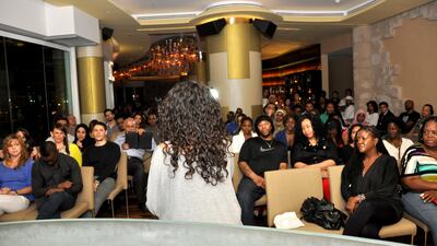 Poet Farah Chamma performs at the Rooftop Rhythms event at the Hilton Capital Grand Hotel in Abu Dhabi. Picture courtesy James Simmons