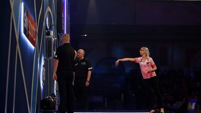 Fallon Sherrock on her way to victory over Mensur Suljovic in the second round of the PDC World Championship at Alexandra Palace, London, on Saturday December 21. In the first round, Sherrock became the first woman to win a match at the event. AP