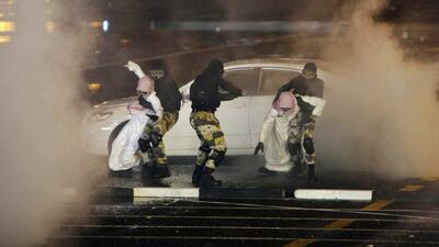 A practice detention scenario is demonstrated as members of the Saudi special forces perform during military drill in preparation for the annual Haj pilgrimage, at a military camp in Arafat, just outside Mecca. AP Photo / Amr Nabil