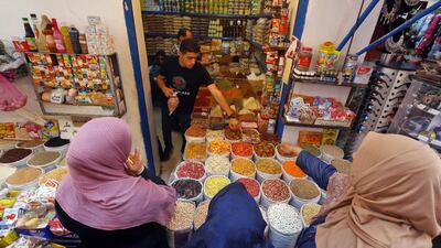 Libyans buy food products at a market as residents of the capital Tripoli get ready for the beginning of the fasting month of Ramadan. AFP